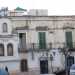 L'ottocentesco palazzo Trulli, simbolo del centro storico di Triggiano: l'edificio versa in stato di abbandono e i suoi storici ipogei giacciono in un mare di rifiuti